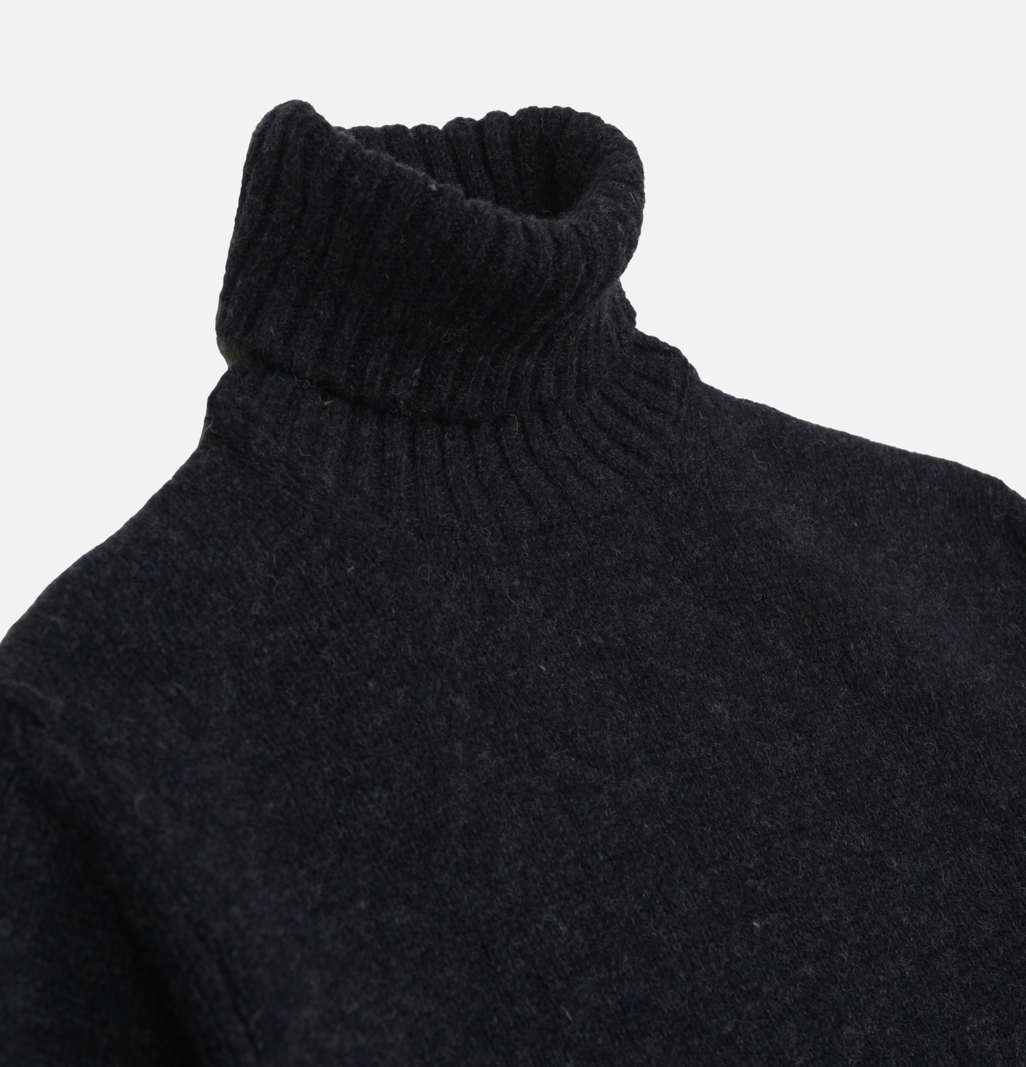 William Lockie Aryan Charcoal roll-neck sweater.